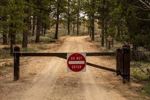 Do Not Enter Gate Across Dirt Road 写真素材