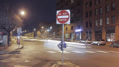 A Do Not Enter Sign and Traffic Night Timelapse Video stock 85575083