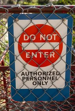 Do not enter sign posted on the steel gate. Restricted area do not enter si.. Stock Photos