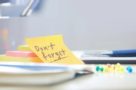 Do not forget text on adhesive note Stock Photos
