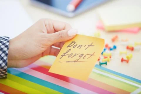 Do not forget text on adhesive note Stock Photos