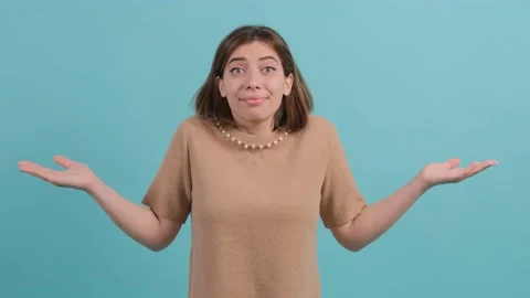 Do not know, sorry. Portrait of clueless girl, feeling confused about question. Stock Footage 140586197