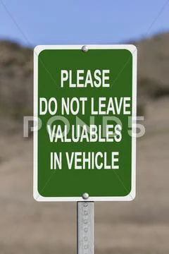Do not leave valuables in vehicle sign Stock Photos