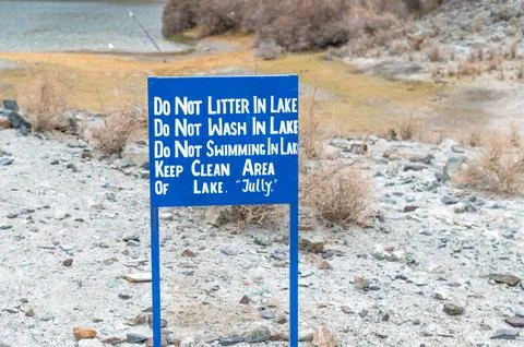 Do Not Litter board on trekking trail in the Himalaya mountains, eco awareness s Stock Photos