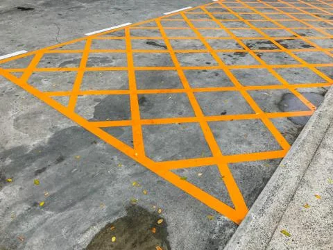 Do not parking this area by the yellow cross traffic line Stock Photos