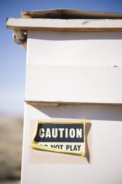 Do Not Play sign of the side of a dumpster. Fotos Stock