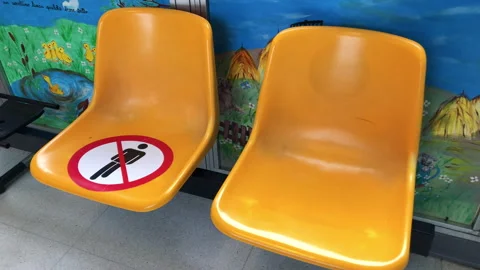 Do not sit here. Keep this seat free. Social distancing Stock-Footage 241605811
