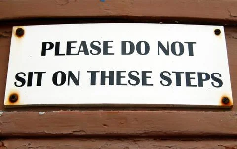 Do not sit on steps sign Fotos de archivo