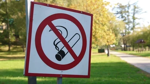 Do not smoke icon in the park Stock Footage