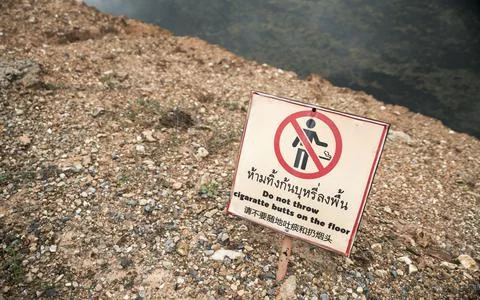 Do not throw cigarette butts on the floor sign Stock Photos