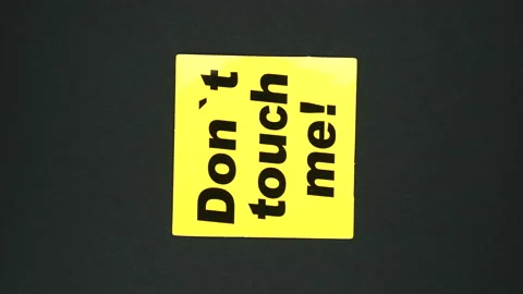 DO NOT TOUCH ME warning sign is turning Stock Footage 127298720