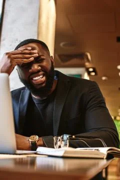 Do not whine Do not complain. Work harder. Exhausted african american male hold Stock Photos