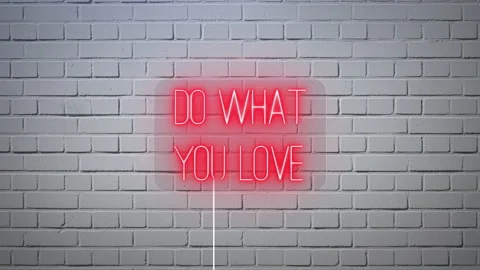 Do what you love phrase neon signboard on white bricks wall background. Stock-Footage 220855487