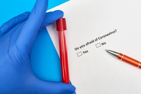 Do you afraid of coronavirus - a question on paper with options Yes and No Stock Photos