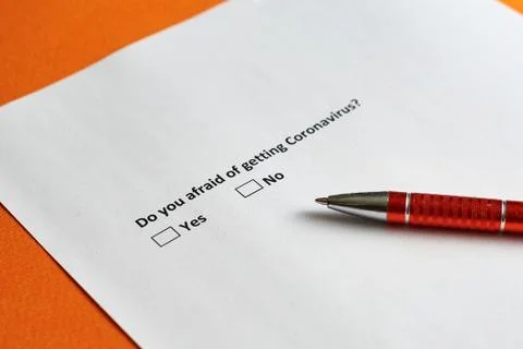Do you afraid of getting coronavirus - a question on paper with options Yes a Stock Photos