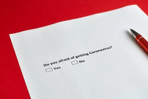 Do you afraid of getting coronavirus - a question on paper with options Yes a Stock Photos