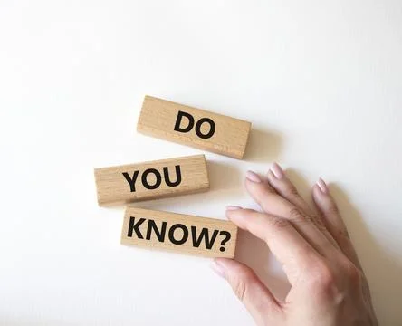 Do you know symbol. Concept word Do you know on wooden cubes. Businessman h.. Stock Photos