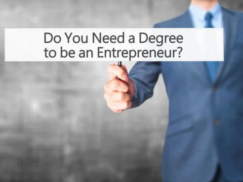 Do You Need a Degree to be an Entrepreneur ? - Businessman hand holding sign Stock-Fotos