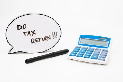 Do your tax return concept with text in speech bubble and calculator on white Stock Photos