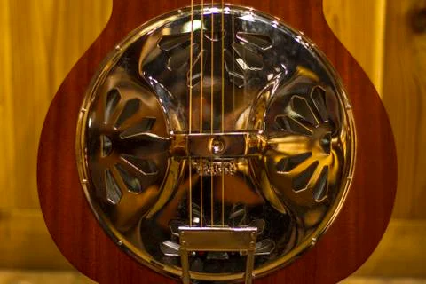 Dobro guitar on wall Stock Photos