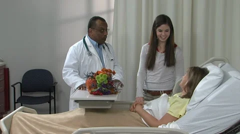 Doc Alonzo and Lauren visit Julie with Dolly move Stock Footage 11140366