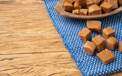 Doce de leite or dulce de leche, traditional south american milk candy over w Stock Photos