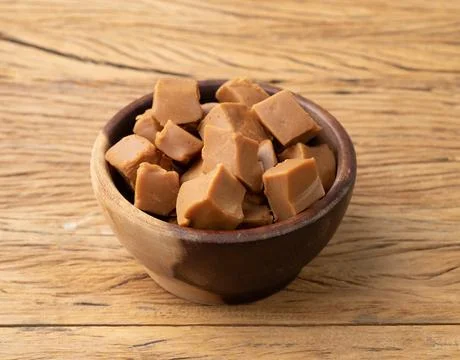 Doce de leite or dulce de leche, traditional south american milk candy over.. Stock Photos