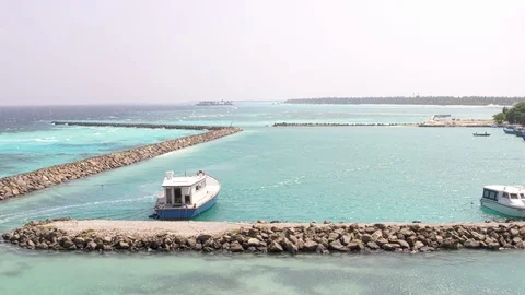 Dock with boats in the Indian Ocean Stock Footage 104093555