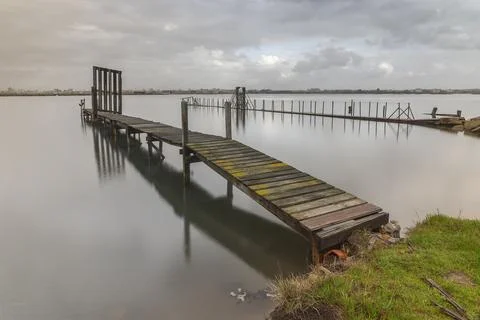 Dock on the Boco River at Bairro do Mata Stock Photos