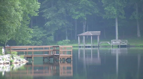 Dock in calm lake Stock Footage 461063
