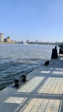 Dock with city in the background Stock Photos