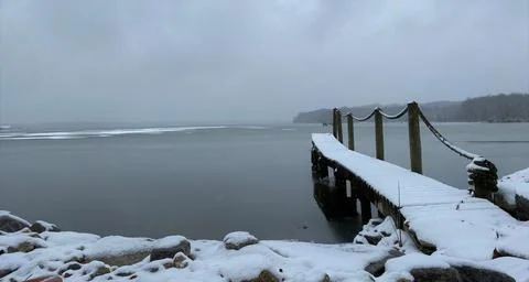 The Dock Covered in Snow Foto stock