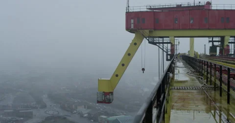 DOCK CRANE - RAINY WEATHER Stock Footage 141534496