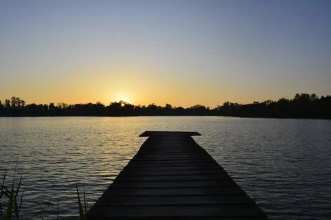 Dock at the end of the day Stock Photos