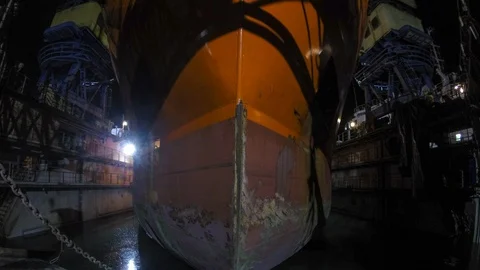 The dock falls under the water. The ship leaves the dock. Stock Footage 86785560