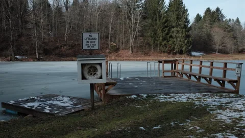 Dock by frozen lake Stock Footage 296485656