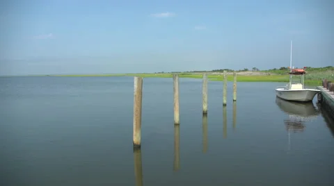 Dock at Ho Hum beach on Fire Island on a sunny day Stock Footage 65451445