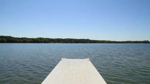 Dock on Minnesota Lake Cloudless Day Stock-Footage 66346606