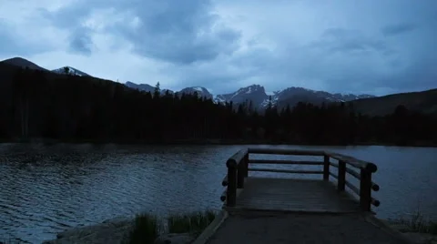 Dock at night with Rocky Mountains in Background Stock Footage 66928838