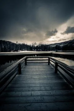 Dock overlooking a lake. Stock Photos