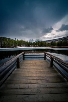 Dock overlooking a lake. Stock Photos