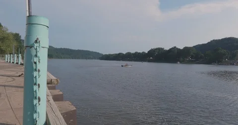 Dock Overlooking River with Rusty Chain Railing Vídeos de archivo 92317761