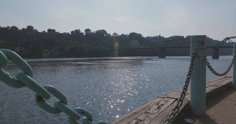 Dock Overlooking River with Rusty Chain Railing Vídeos de archivo 92321262