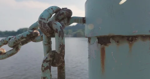 Dock Overlooking River with Rusty Chain Railing 動画素材 92322441