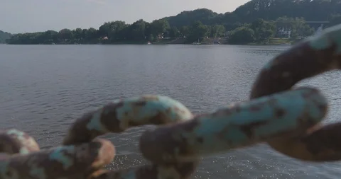 Dock Overlooking River with Rusty Chain Railing Vídeos de archivo 92322798