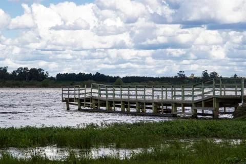 Dock on the river Stock Photos