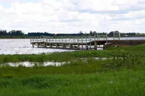 Dock on the river Stock Photos