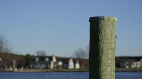 Dock support pole in foreground with rack focus to background Stock Footage 45920580