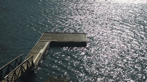 Dock without boat in atlantic ocean with waves and ripples Stock Footage 119892420
