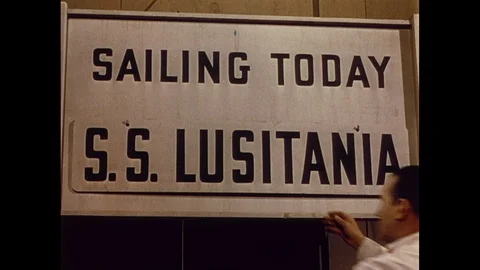 Dock worker removing S.S. Lusitania sign, 1940s Video stock 90728032